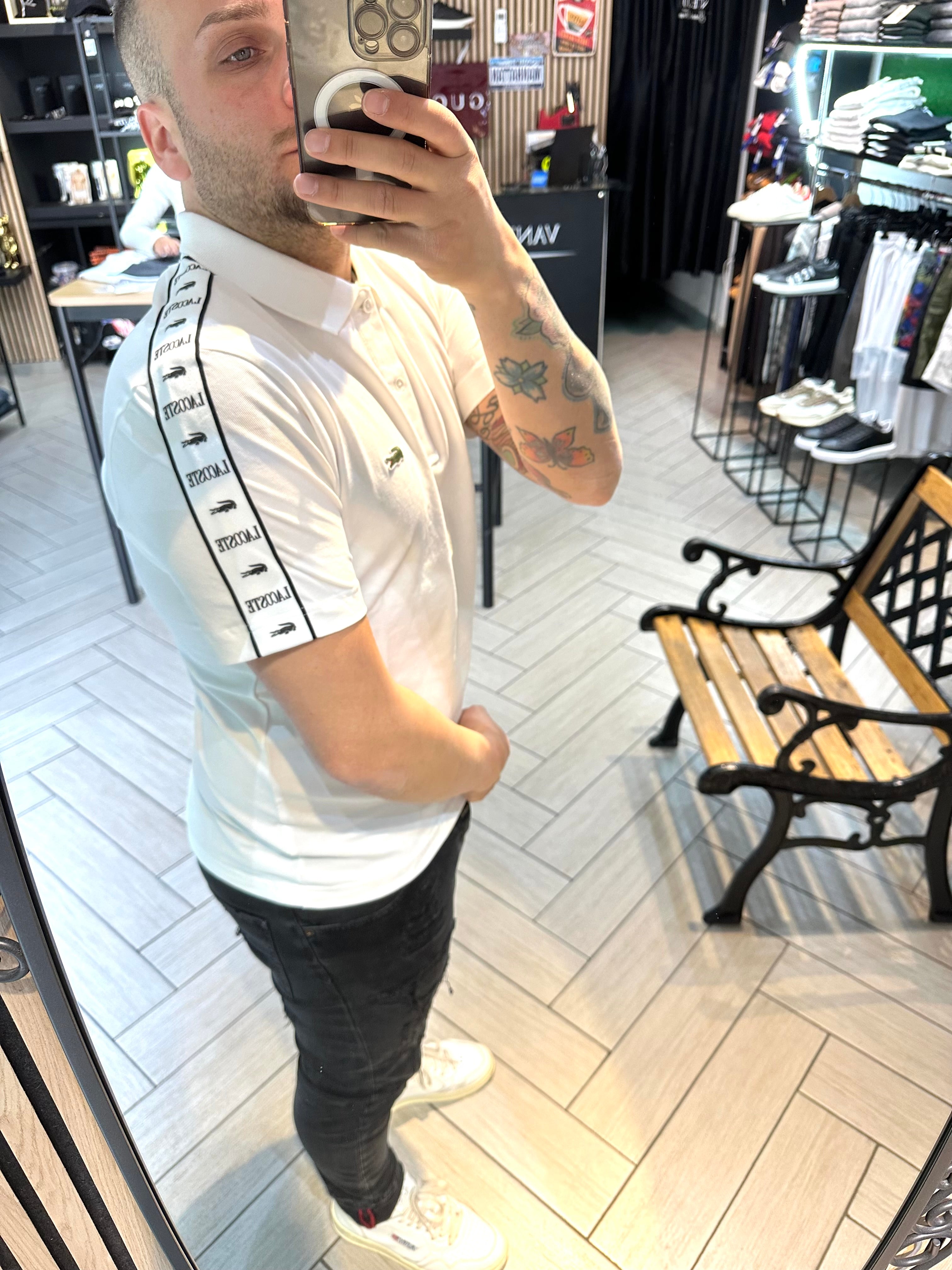 Polo Lacoste con fascia bianca