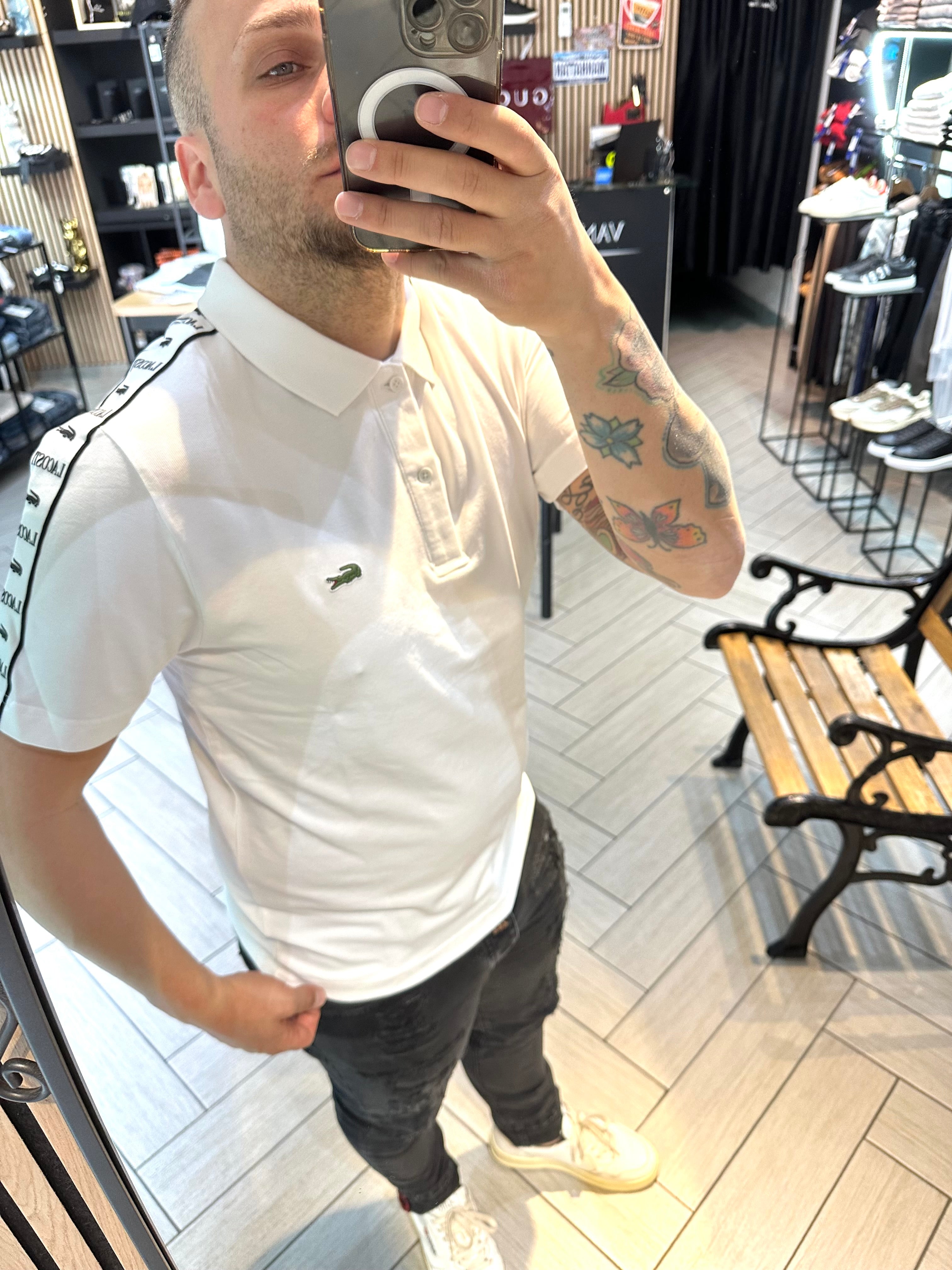 Polo Lacoste con fascia bianca