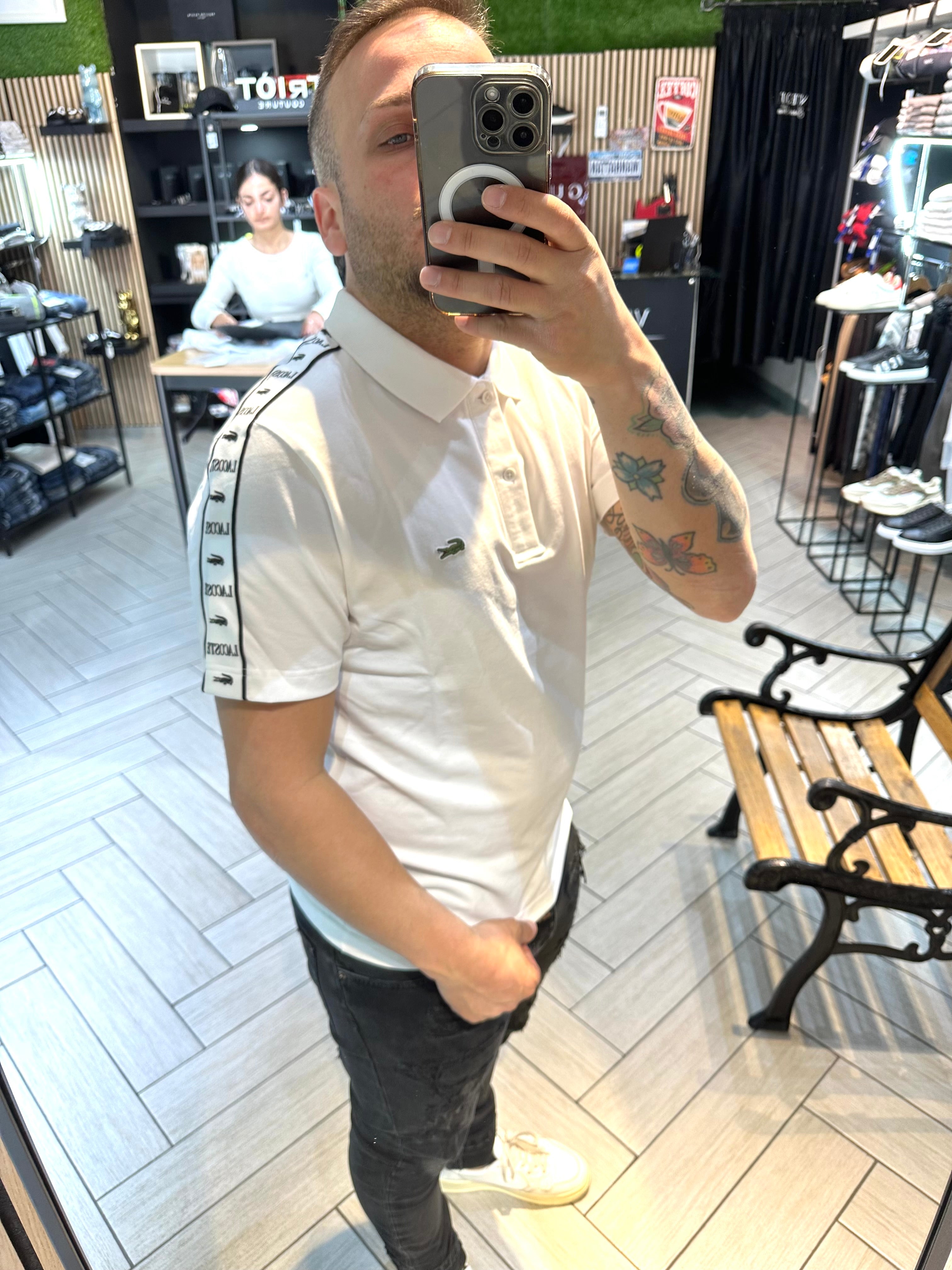 Polo Lacoste con fascia bianca